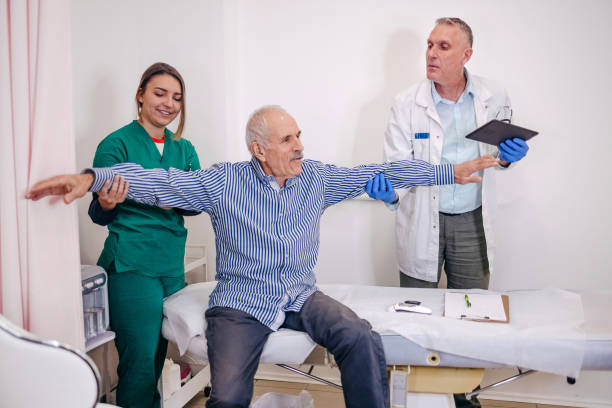 istock Old man having doctor visit at hospital 1744384115