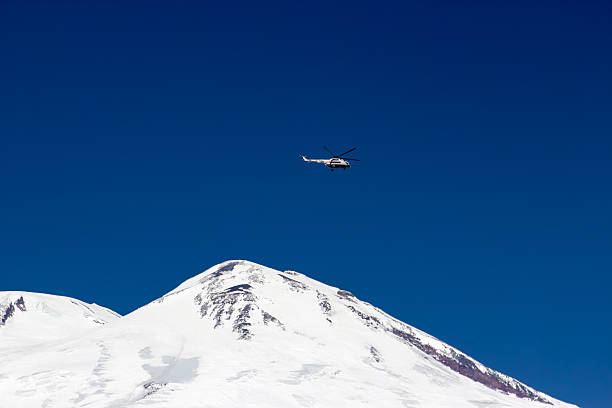 istock Rescue helicopter in the mountains 174438441