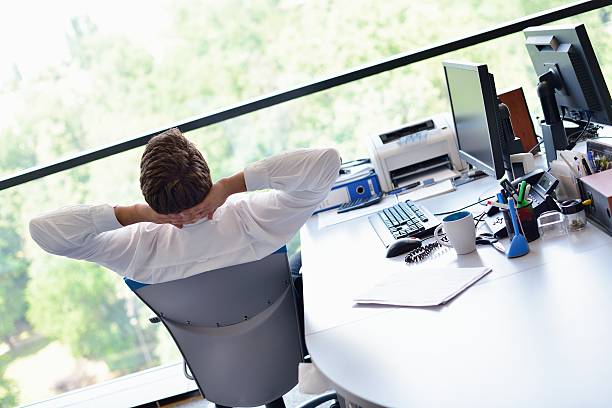 istock happy young business man at office 174438492