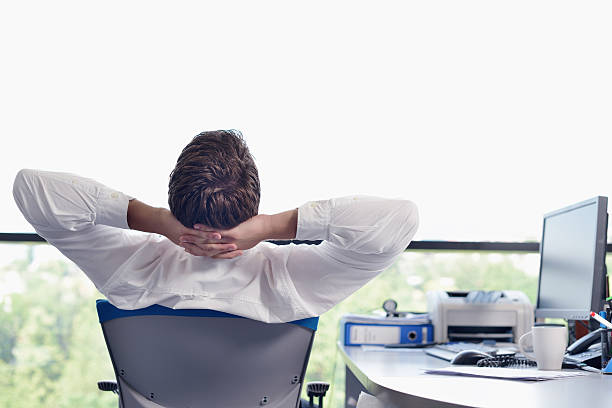 istock happy young business man at office 174439957