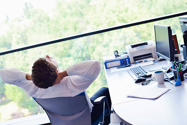 istock happy young business man at office 174440029