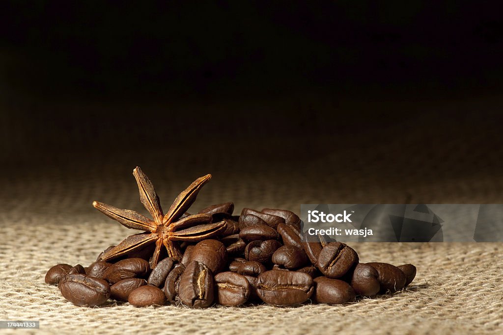 Coffee and Star Anise on sackcloth with copyspace Coffee and Star Anise on sackcloth background with copyspace Agriculture Stock Photo