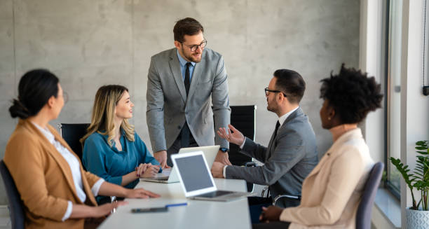 istock Team leader discussing and brainstorming new approaches and ideas with colleagues. 1744430366