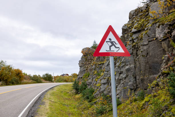 Cross-country skiing warning sign in the Lofoten Islands mountains , Norway