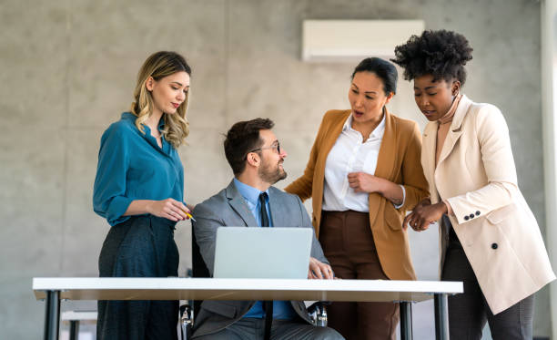 istock Group of diverse multiethnic business people and software developers working as a team in office 1744453476