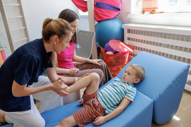istock Doctor working with preschool boy, holistic hands-on approach in occupational therapy 1744459772