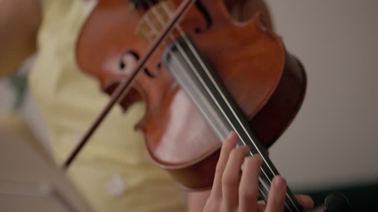 Woman violinist practicing