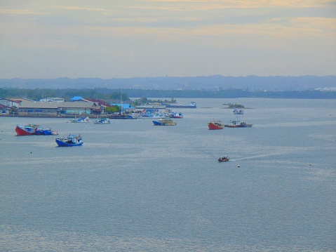 fishing boat in the wide ocean