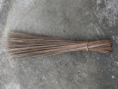 Brooms are made from coconut leaf sticks
