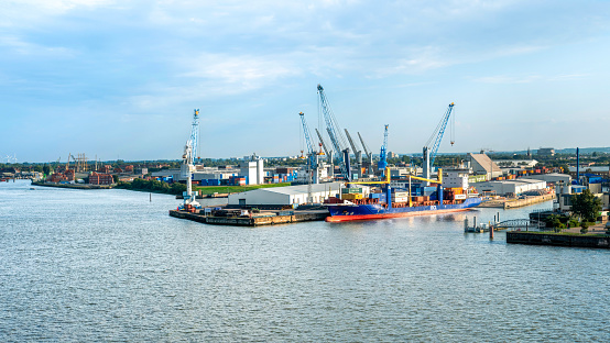 Hamburg, Germany - September 18. 2023: Further view over the port facilities of the port of Hamburg in the late afternoon