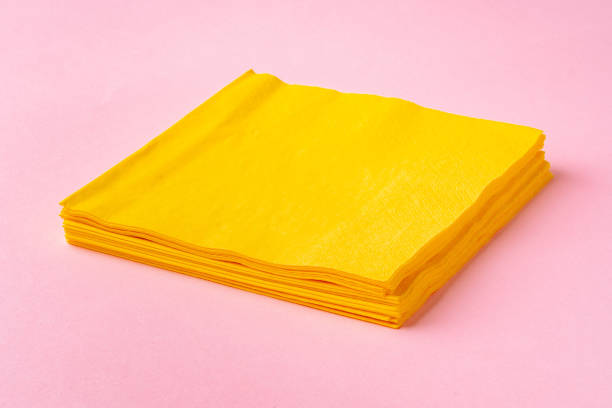 istock Paper napkins on pink background close up 1744516856