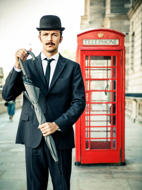 englishman' - telephone booth telephone london england red foto e immagini stock