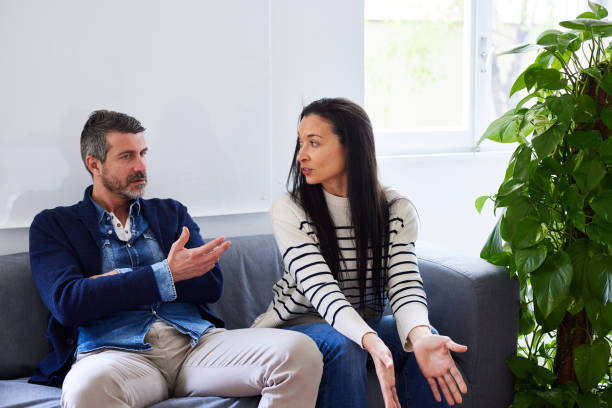 istock Couple arguing and blaming each other at counselor's office 1744529777