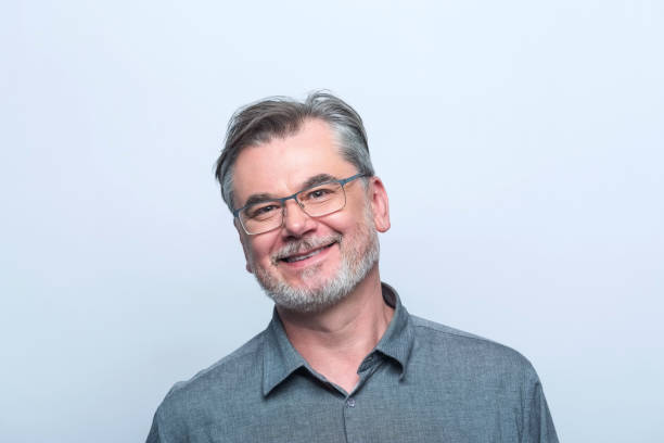 istock Portrait of smiling mature man 1744542612
