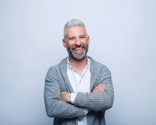 istock Portrait of smiling mature man 1744543161