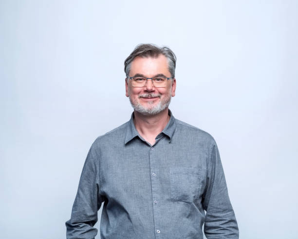 istock Portrait of smiling mature man 1744543763