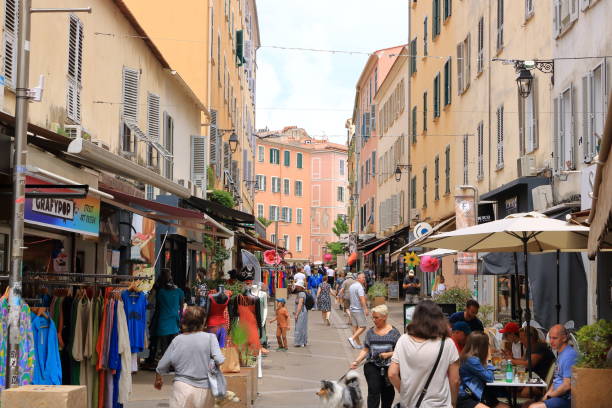 May 31 2023 - Ajaccio, Corsica in France: people walk through the old city on an sunny day