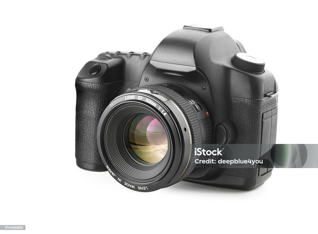 DSLR camera with mounted 50mm f1.4 lens on white background Camera - Photographic Equipment Stock Photo