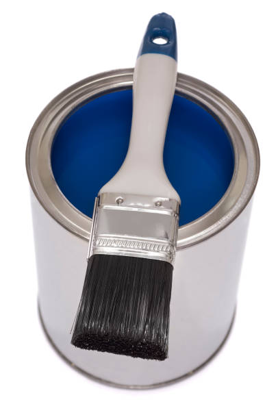 istock Paintbrush on a tin of blue paint 174457947