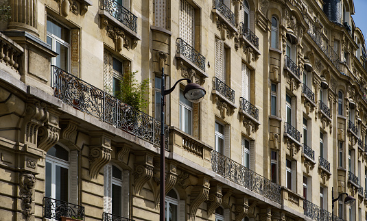 Traditional French multistory house with balconies. PARIS - 29 APRIL,2019