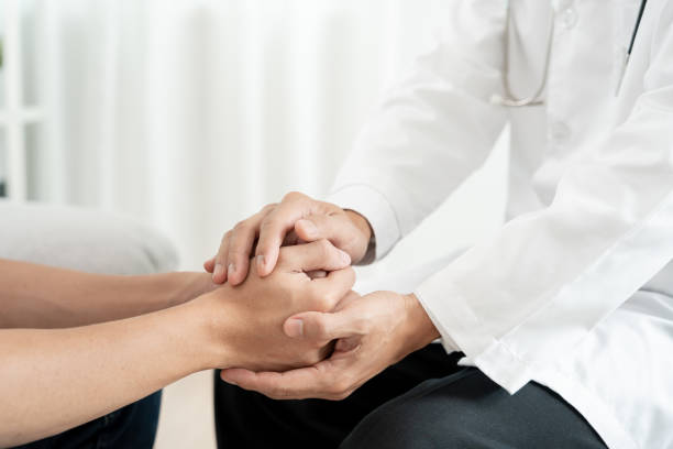 istock psychiatrist hold hand support each while discussing family issues. doctor encourages and empathy woman suffers depression. psychological, save divorce, Hand in hand together, trust, care 1744584625