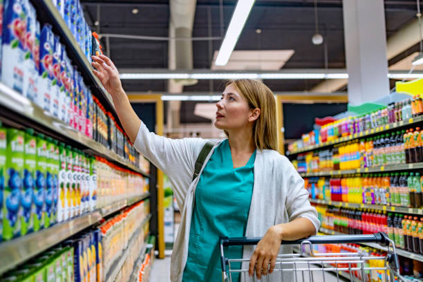 istock Woman doing Shopping at Market 1744587547