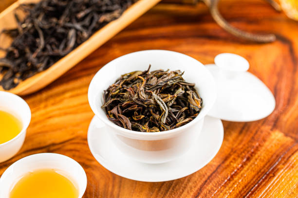 istock Brewing Chinese tea in ceramic gaiwan during the tea ceremony close-up. 1744615211