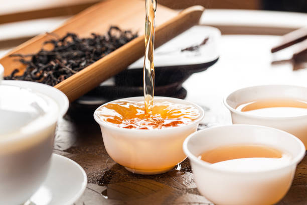 istock Brewing Chinese tea in ceramic gaiwan during the tea ceremony close-up. 1744619883