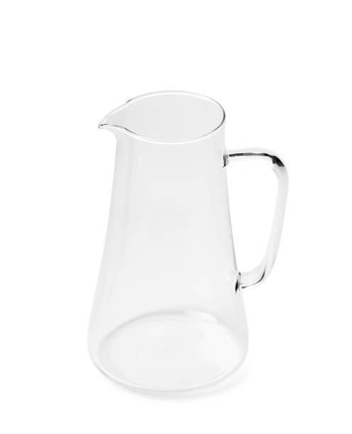 istock Empty glass jug for milk and drinks on a white background, isolated. 1744640277