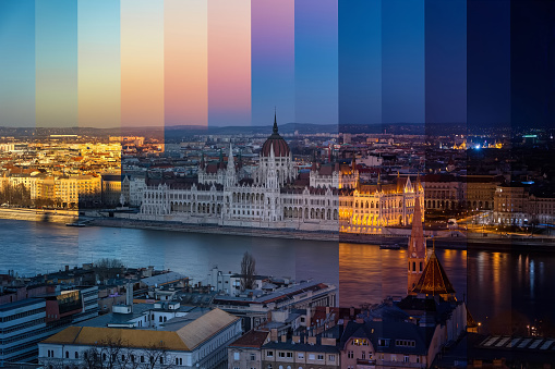 Sliced day to night time lapse view of the Hungarian Parliament Building at River Danube in Budapest
