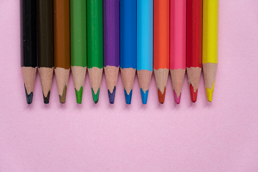 image of colored pencils on a white background