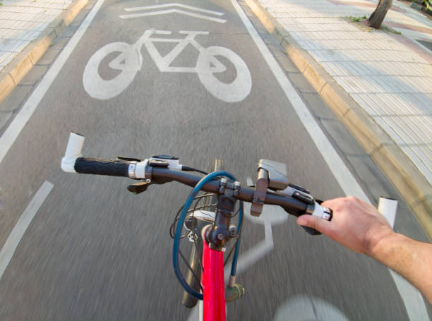 istock Cyclist riding y priority lane for bikes and electric kick scooters 1744676197
