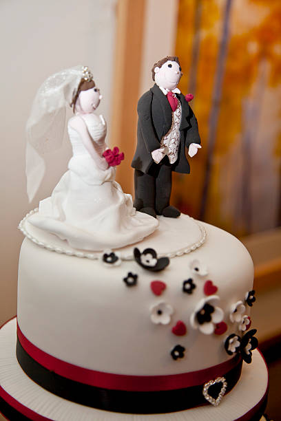 istock Wedding Cake top with bride and groom figures 174468259