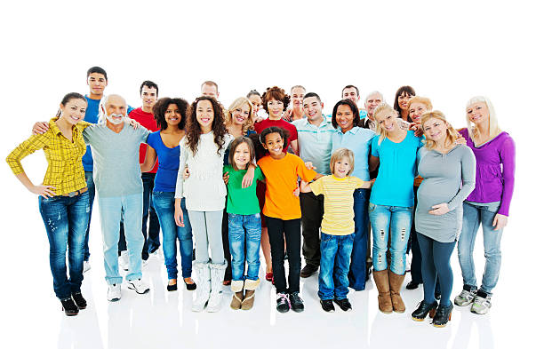 Cheerful embraced mixed age group of people. Large group of embraced people standing together. They are isolated on white background.     human age child multi ethnic group group of people stock pictures, royalty-free photos & images