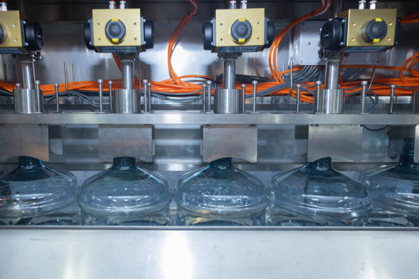 istock Automatic Mineral Water Bottle Filling Machine 1744703565