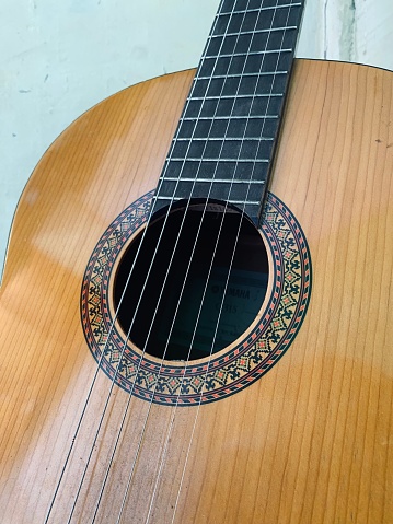 portrait of guitar strings on a classical guitar