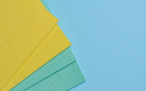 istock Square sponges for the kitchen and home on a blue background 1744749148