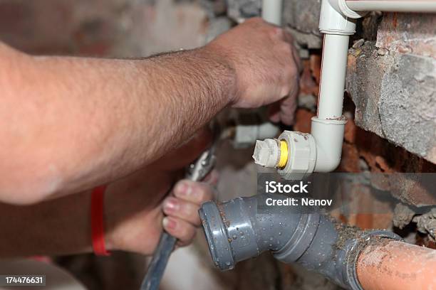 Plumber Stock Photo - Download Image Now - Building Contractor, Business, Concrete