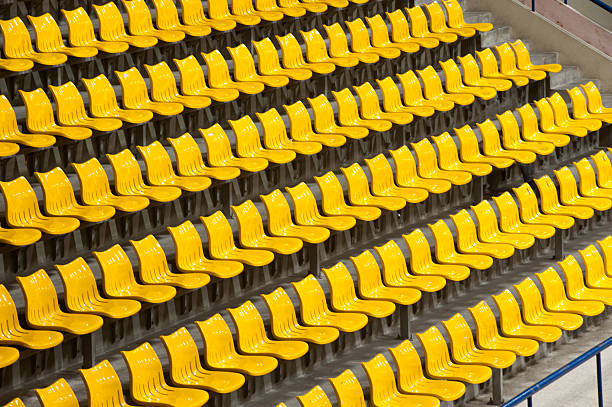istock Yellow plastic seats at Basketball stadium . 174477057
