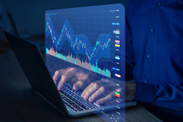 istock Stock exchange trading data and financial investment. Person using online trading interface with charts and statistics on computer screen to analyze ETF and ticker price evolution. Sell or buy. 1744773908