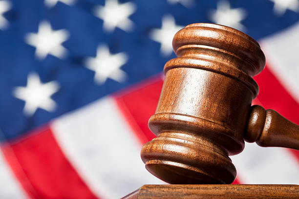 istock Judge's gavel against US flag 174477727