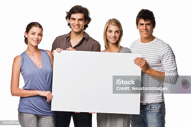 Girls And Boys Holding A Blank Board Stock Photo - Download Image Now - 20-24 Years, Adult, Beautiful People