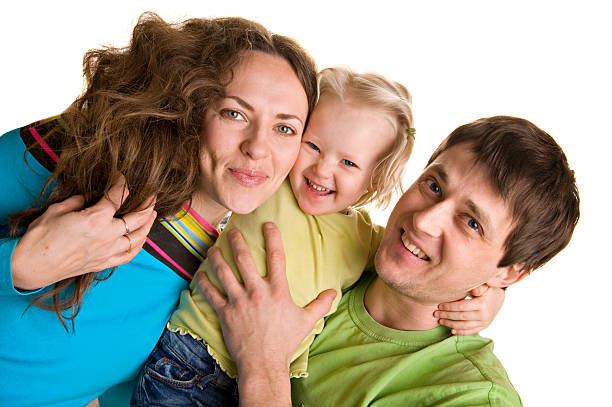 Smiling young family spending time together