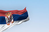 Serbia national flag waving in the wind on a clear day