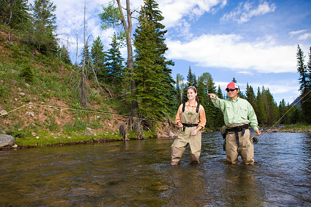 Fly Fishing Together in Mountain Stream