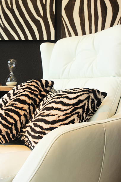 cadeira de pele de zebra almofada artigo de decoração - furniture store furniture retail textile imagens e fotografias de stock