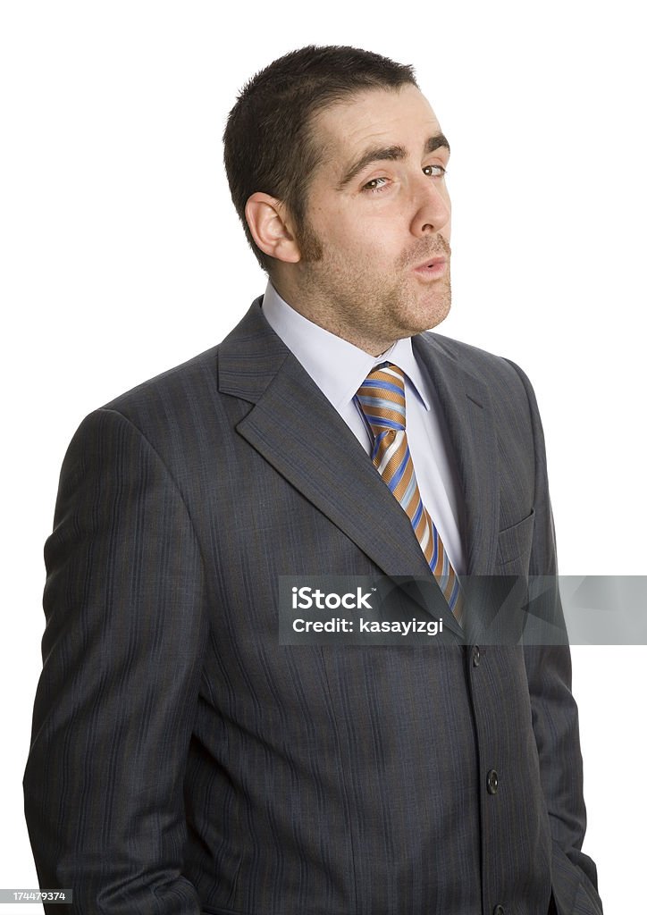 business man whistling business man whistling hands in pocket People Stock Photo