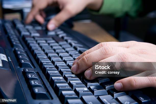 Using Computer Series Stock Photo - Download Image Now - Adult, Back Lit, Blue