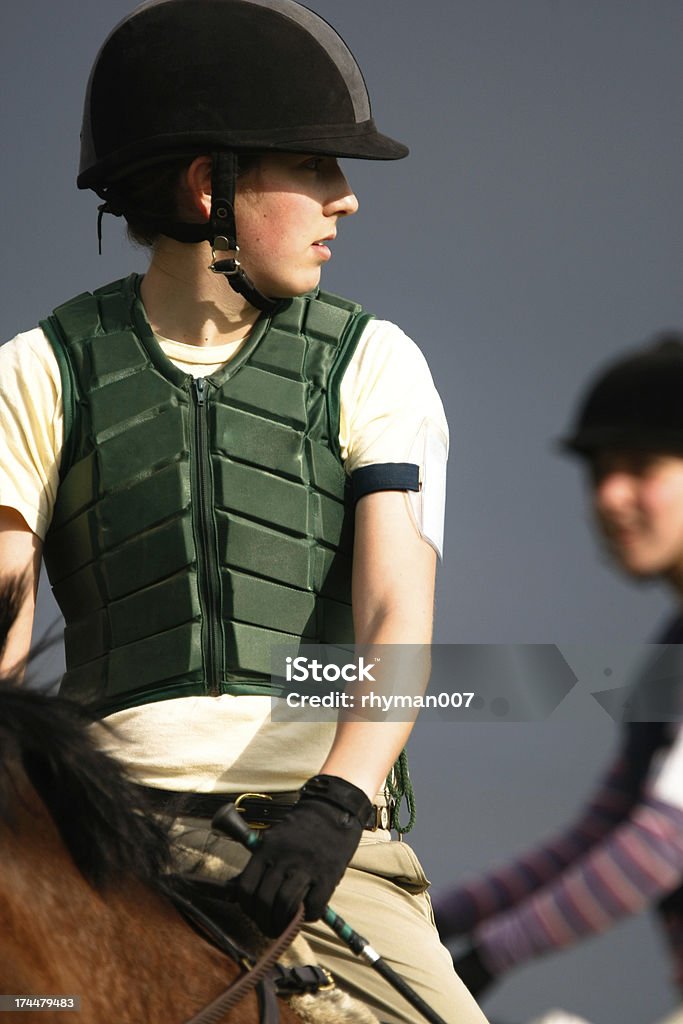 Cross Country Rider A cross country rider on her horse. Waistcoat Stock Photo