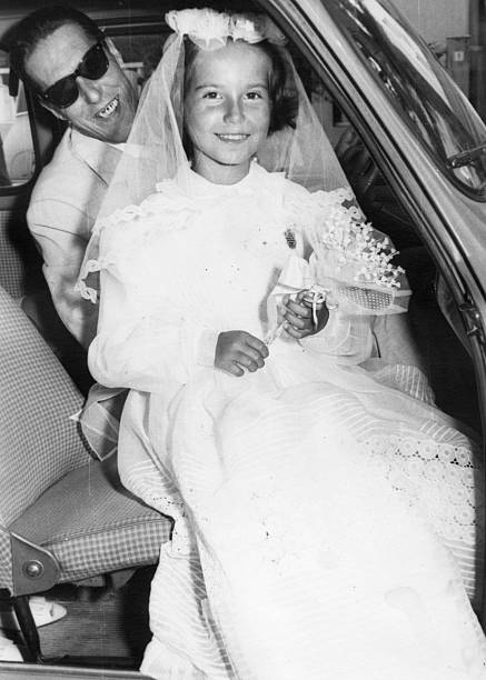 istock Father and daughter in 1958,first communion day. 174479510